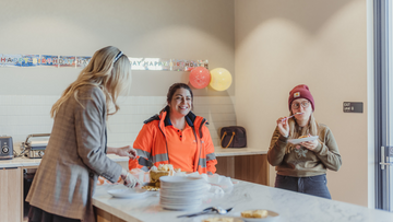 Three women having lunch - International Women's Day