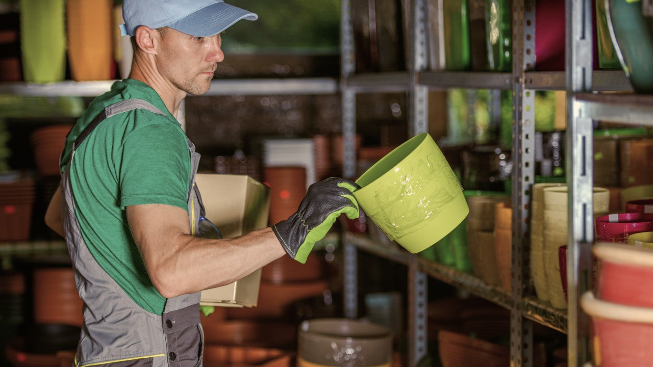 A guy golding a pot