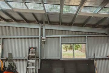 Shed Interior with Additional Insulation and Skylights
